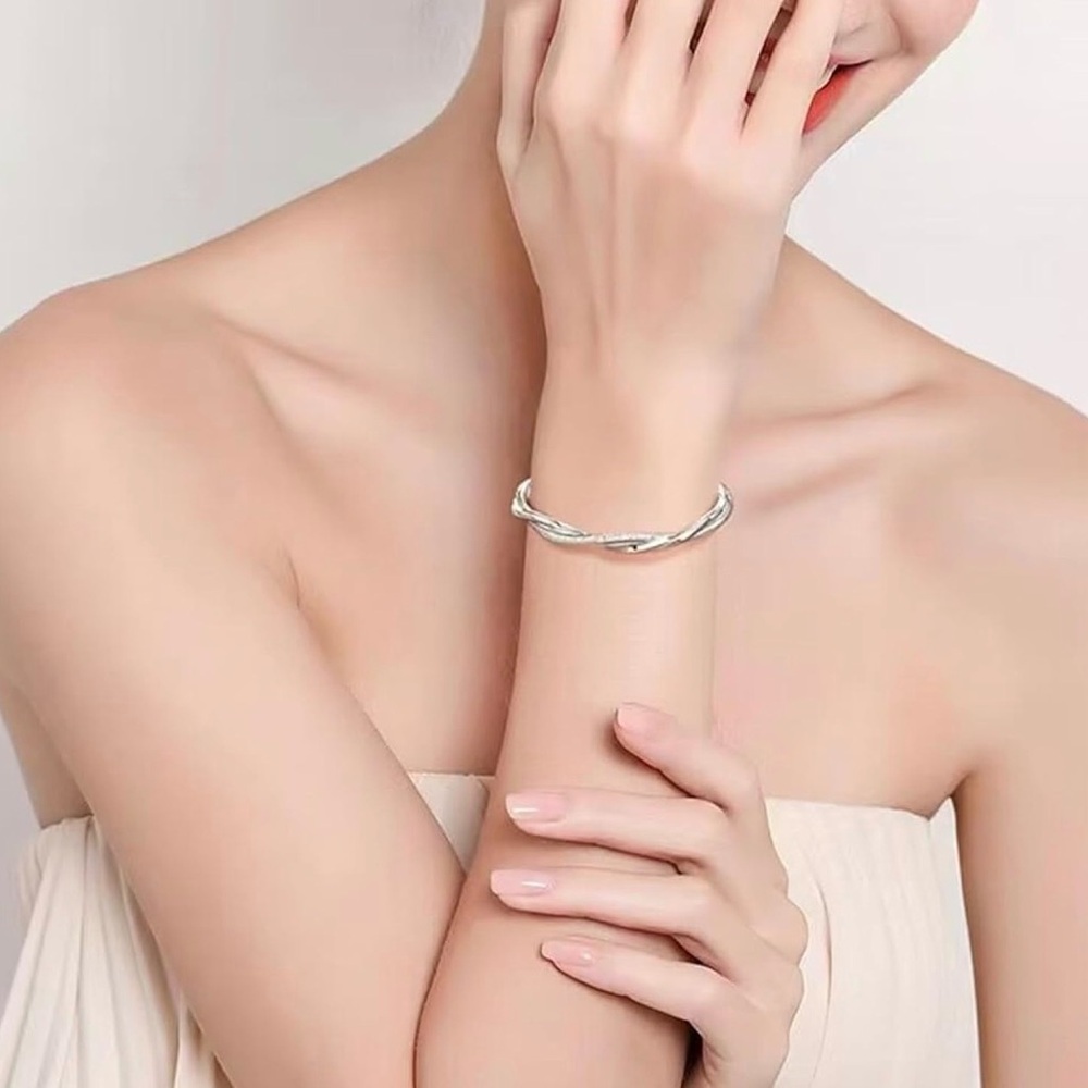 Elegant Silver Twist Bangle | Sculptural Adjustable Slide Bracelet